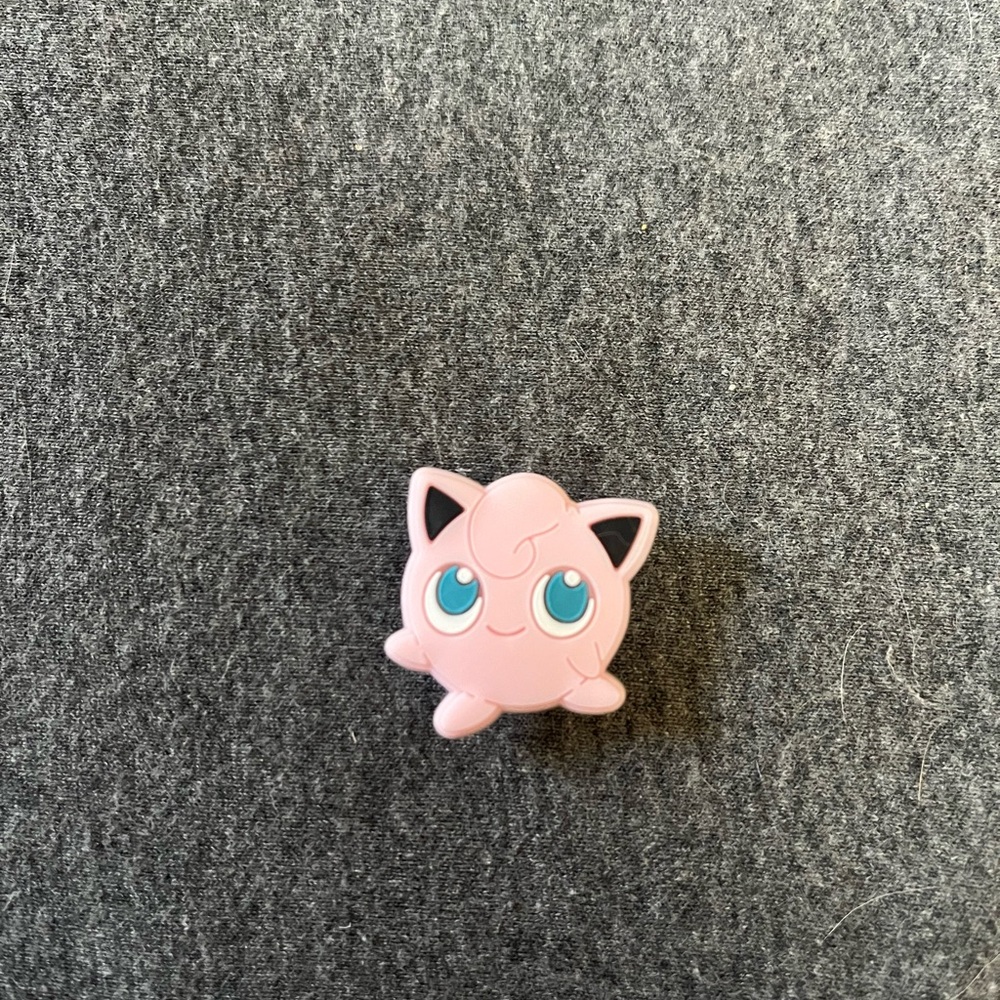 Pokémon Jigglypuff Croc Charm never used!

(Bundle for a lower price)
